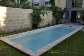 Volet immergé pour piscine rectangulaire, lames en polycarbonate